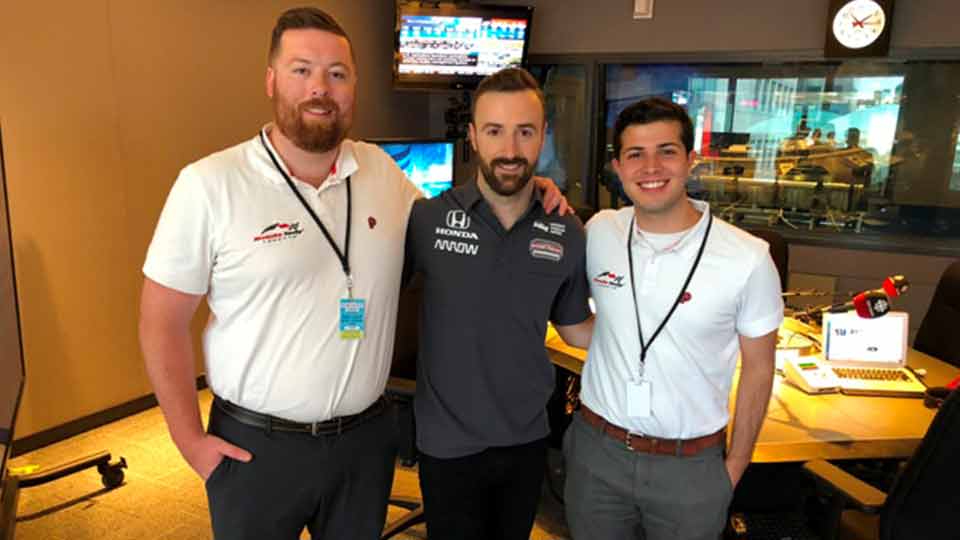 Interns Zach and Santiago with James Hinchcliffe of Schmidt Peterson Motorsports