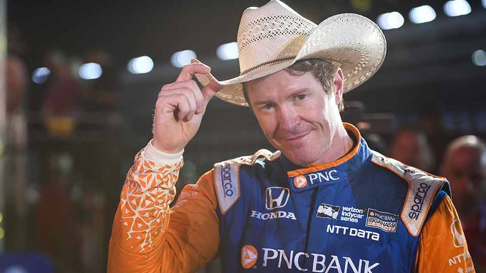 Scott Dixon tips his cowboy hat after winning in Texas
